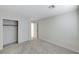 Inviting bedroom features plush carpeting and ample closet space for storage at 5216 Aztec Heights St, North Las Vegas, NV 89081