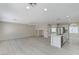 Large living room area with recessed lighting, and open floor plan at 5216 Aztec Heights St, North Las Vegas, NV 89081