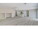 Expansive living room flows seamlessly into the modern kitchen, perfect for entertaining and Gathering gatherings at 5216 Aztec Heights St, North Las Vegas, NV 89081