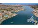 Breathtaking aerial view of Lake Las Vegas featuring waterfront properties, golf course, and stunning mountain backdrop at 54 Mirage View Dr, Henderson, NV 89011