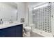 Modern bathroom with patterned tiles and glass shower at 54 Mirage View Dr, Henderson, NV 89011