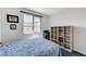 Comfortable bedroom featuring a built-in shelf for storage space and natural light at 54 Mirage View Dr, Henderson, NV 89011