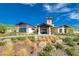 Attractive community center with modern architecture, lush landscaping, and inviting entrance at 54 Mirage View Dr, Henderson, NV 89011