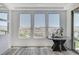 Bright dining area with mountain views through large windows and access to an outdoor patio at 54 Mirage View Dr, Henderson, NV 89011