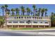 Welcoming Lake Las Vegas sign surrounded by palm trees, shopping, restaurants, golf, and residential areas at 54 Mirage View Dr, Henderson, NV 89011