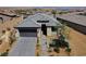 Beautiful single-Gathering home featuring a well-manicured front yard and an attached two-car garage at 54 Mirage View Dr, Henderson, NV 89011