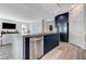 Modern kitchen with stainless steel appliances, and dark blue cabinetry at 54 Mirage View Dr, Henderson, NV 89011