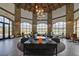 Grand lobby featuring stone accents, high ceilings, stylish seating, and scenic views at 54 Mirage View Dr, Henderson, NV 89011