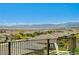 Scenic view of the neighborhood showcasing rooftops and distant mountains at 54 Mirage View Dr, Henderson, NV 89011