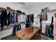 Large walk-in closet featuring custom shelves, and abundant storage space at 54 Mirage View Dr, Henderson, NV 89011