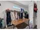 Spacious walk-in closet features ample hanging space and stylish decor at 54 Mirage View Dr, Henderson, NV 89011