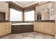 This bathroom has dual vanities, garden tub, and tile floors at 5404 Ireland St, Las Vegas, NV 89149