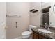 Bathroom featuring granite countertop, modern sink, and glass shower enclosure at 5404 Ireland St, Las Vegas, NV 89149