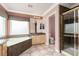 Bathroom featuring a soaking tub and a marble shower stall at 5404 Ireland St, Las Vegas, NV 89149