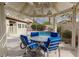 Beautiful backyard gazebo with outdoor seating overlooking a sparkling pool and lush landscaping at 5404 Ireland St, Las Vegas, NV 89149