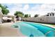Backyard pool offering a tranquil escape with a spa and beautifully landscaped surroundings for ultimate relaxation at 5424 Neosho St, Las Vegas, NV 89120