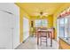 Eat-in kitchen with sliding glass door to backyard at 5600 W Bartlett Ave, Las Vegas, NV 89108