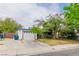 Charming single-story home with a two-car garage and mature trees at 5600 W Bartlett Ave, Las Vegas, NV 89108