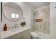 Modern bathroom with a marble tiled shower, sleek vanity, and upscale fixtures, creating a serene retreat at 5904 Apple Valley Ln, Las Vegas, NV 89108
