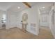 Bright entryway features light hardwood floors, decorative mirror, and an open doorway at 5904 Apple Valley Ln, Las Vegas, NV 89108