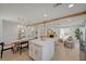 Spacious kitchen with island, seamlessly connected to the dining and living areas at 5904 Apple Valley Ln, Las Vegas, NV 89108