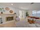 Bright living room with hardwood floors and decorative fireplace at 5904 Apple Valley Ln, Las Vegas, NV 89108