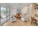 Cozy living room features sliding glass doors to the backyard and built-in cabinets at 5904 Apple Valley Ln, Las Vegas, NV 89108