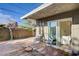 Quaint patio with comfortable seating area, a perfect spot to enjoy the outdoors at 5904 Apple Valley Ln, Las Vegas, NV 89108