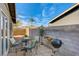 Charming patio with barbecue and seating for outdoor entertaining and relaxing at 5904 Apple Valley Ln, Las Vegas, NV 89108