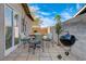 View of the patio with outdoor dining area and barbecue at 5904 Apple Valley Ln, Las Vegas, NV 89108