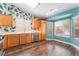 Bright kitchen with stainless steel appliances, light wood cabinets and adjacent eat-in dining area at 6056 Flowering Plum Ave, Las Vegas, NV 89142
