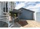 Backyard featuring a spiral staircase, covered patio, and low-maintenance desert landscaping at 6520 Turtle Hill Rd, Las Vegas, NV 89110