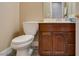 Bathroom featuring a vanity with storage and a toilet, offering essential amenities in a compact space at 6520 Turtle Hill Rd, Las Vegas, NV 89110