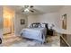 Comfortable bedroom with a queen bed and ensuite bathroom at 6520 Turtle Hill Rd, Las Vegas, NV 89110