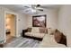 Inviting living area featuring a comfortable sectional sofa and stylish decor at 6520 Turtle Hill Rd, Las Vegas, NV 89110