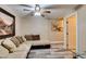 Inviting living area featuring a comfortable sectional sofa and stylish decor at 6520 Turtle Hill Rd, Las Vegas, NV 89110
