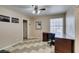 Home office featuring tiled floors, a large window, and a desk, providing an ideal workspace at 6520 Turtle Hill Rd, Las Vegas, NV 89110