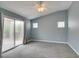 Bedroom featuring carpet, a vaulted ceiling, and a sliding glass door at 709 Heritage Point Dr, Henderson, NV 89002