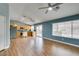 Spacious living area with wood-look floors and access to the backyard through sliding glass doors at 709 Heritage Point Dr, Henderson, NV 89002