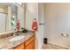 Bathroom featuring granite countertops, neutral walls, and tile flooring at 7200 Pirates Cove Rd # 2071, Las Vegas, NV 89145