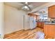 Spacious kitchen featuring granite countertops, modern appliances, and wood floors at 7200 Pirates Cove Rd # 2071, Las Vegas, NV 89145