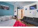 This bedroom includes decor and a futon at 7517 Elk Meadows Ct, Las Vegas, NV 89131