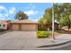 Charming single-story home with a well-manicured front yard, two-car garage, and inviting curb appeal at 7517 Elk Meadows Ct, Las Vegas, NV 89131