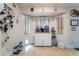Bright kitchen nook with a beverage station and pet door at 7517 Elk Meadows Ct, Las Vegas, NV 89131