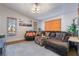 Cozy living room showcasing vaulted ceilings, neutral paint, and plenty of comfortable seating at 7517 Elk Meadows Ct, Las Vegas, NV 89131