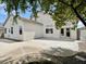 Spacious backyard patio area with a neutral-colored stucco exterior and ample sunlight at 8084 Black Orchid Ave, Las Vegas, NV 89131