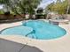 Backyard pool features built in spa with water feature and steps at 8084 Black Orchid Ave, Las Vegas, NV 89131