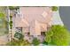 An aerial view of the home showing the tile roof, manicured backyard and outdoor living space at 8117 Horizon Lake Dr, Las Vegas, NV 89128
