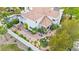 Aerial view of a landscaped backyard with a pool, outdoor seating, and mature trees at 8117 Horizon Lake Dr, Las Vegas, NV 89128