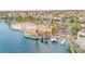Aerial view of lakefront community with clubhouse, paddle boats and a sandy beach at 8117 Horizon Lake Dr, Las Vegas, NV 89128